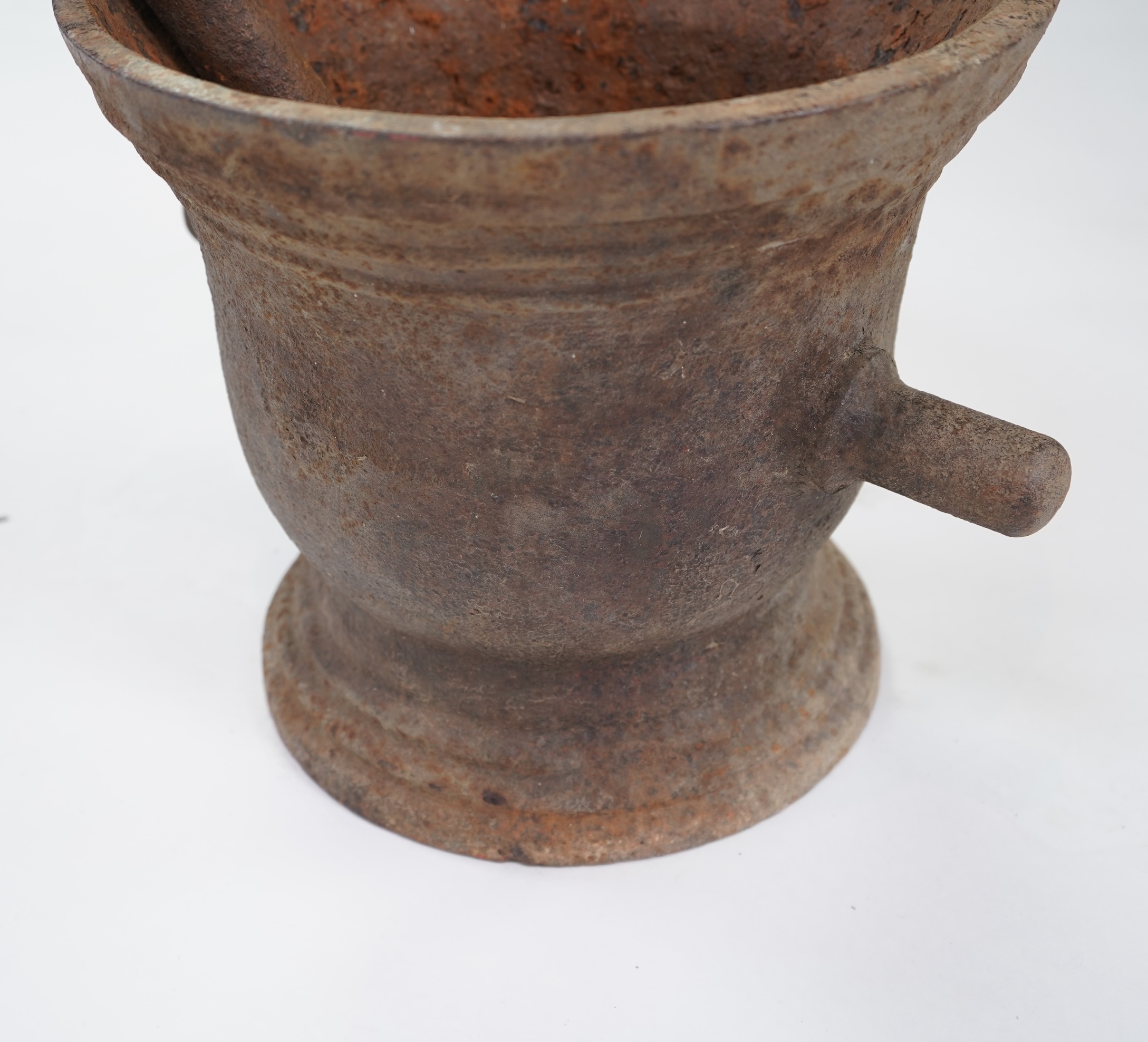 A large 18th/19thc cast iron mortar and pestle